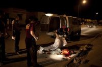 A young man is found shot to death in a residential neighborhood in Palomas,  Mexico,  on August 3,  2009. Palomas is a small town of about 7, 500 people,  located just west of Juarez along the border with Columbus,  New Mexico.